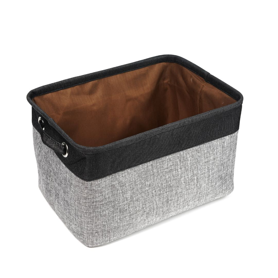 A grey and black storage basket made in line 