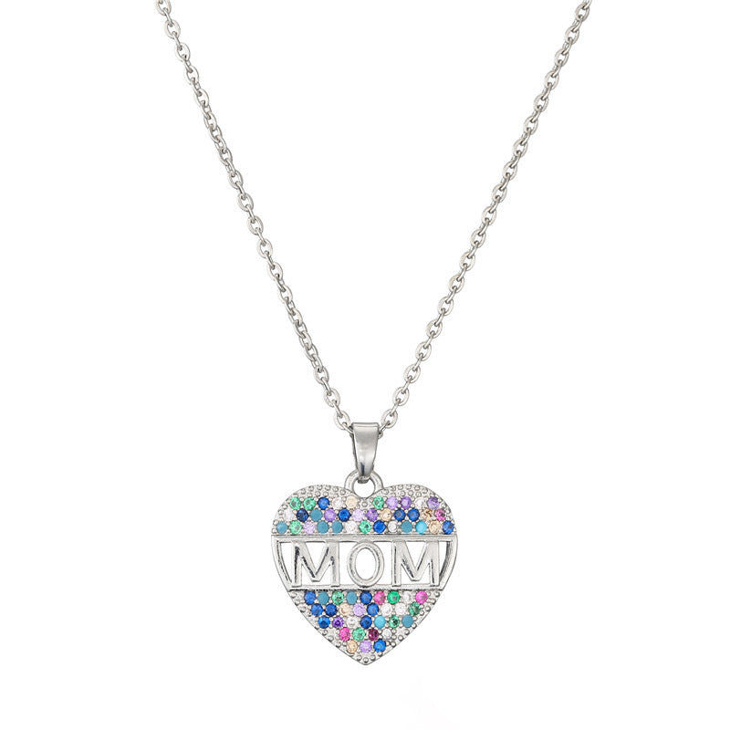 Beautiful silver heart MOM pendant necklace on a white canvas