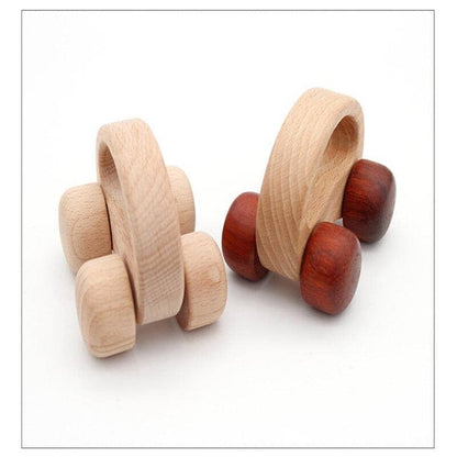Two wood car toys for babies on a white canva