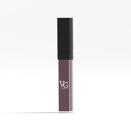 A vegan liquid lipstick in a deep purple shade