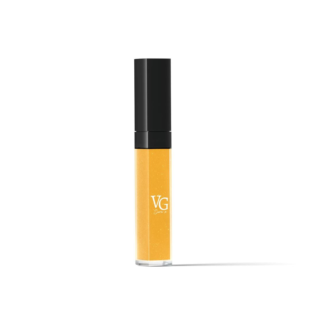 gold color vegan lip gloss, cruelty-free , vegan in a transparent container 