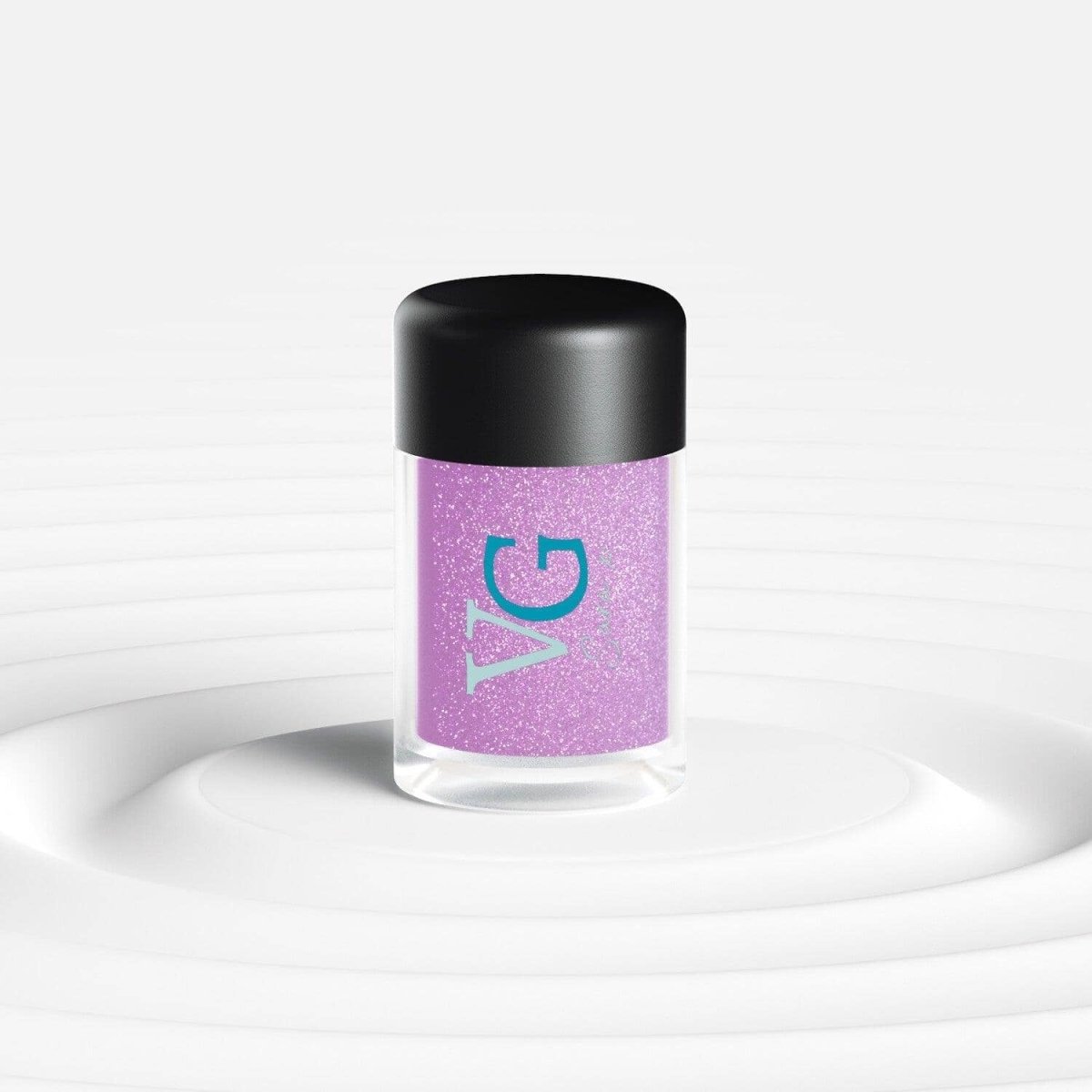 A bottle of purple Cruelty-Free Mineral Stardust Glitter featuring a 'G' on the label