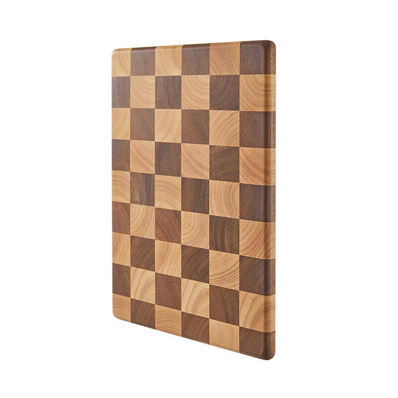An acacia wood  chopping board looking as a chess table