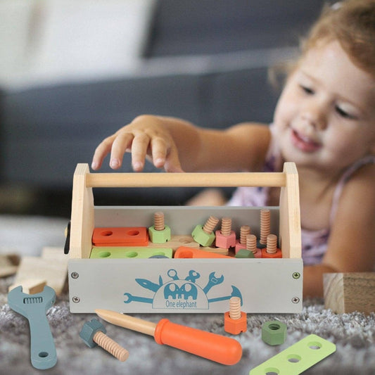 A young girl playing with her simulation repair toolbox set designed for children
