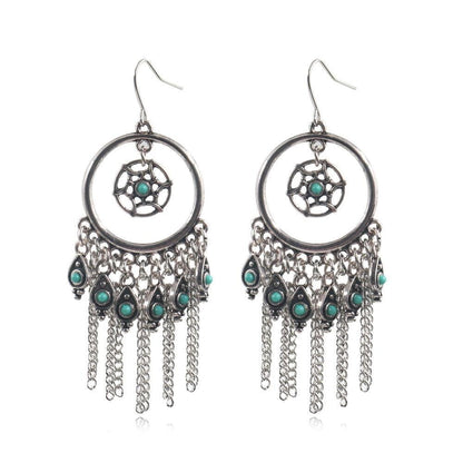 Handcrafted silver earrings with turquoise bead inlays