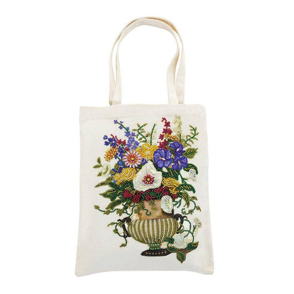 Eco-friendly tote bag ready for DIY painting of floral vase design