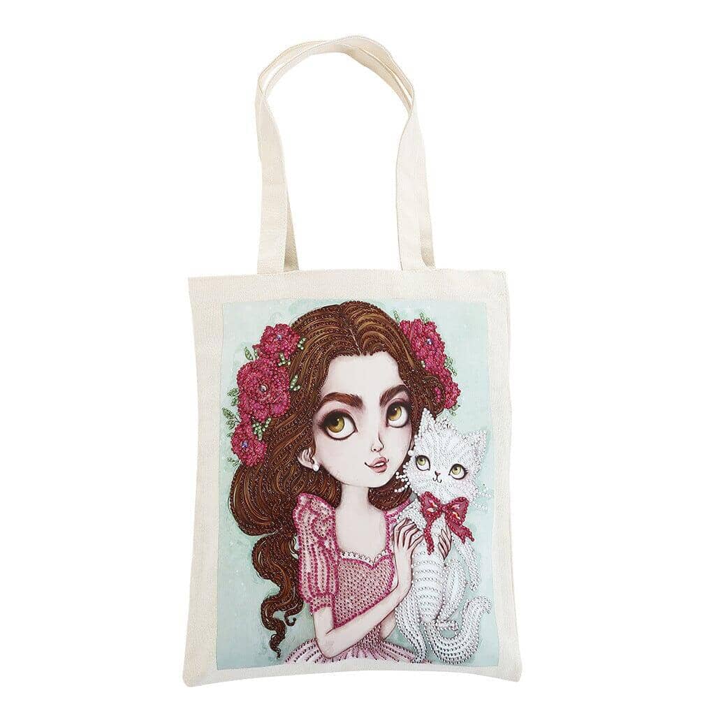 Canvas bag depicting a girl and cat, ready for diamond painting customization