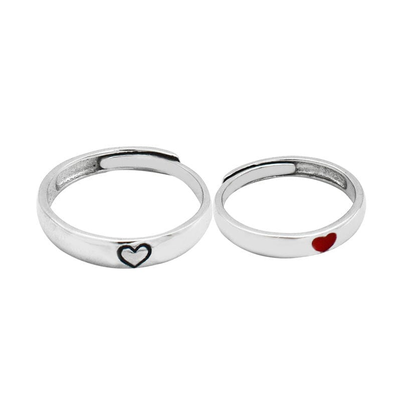 Sterling silver couple rings featuring heart motifs