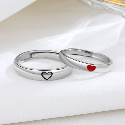 Eco-friendly sterling silver bands with intertwined heart patterns