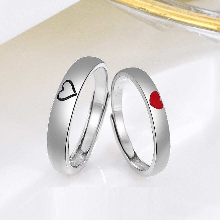 Pair of eco-friendly sterling silver rings with heart designs