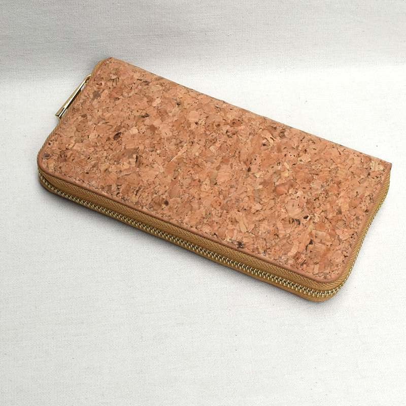A  colsed fashion Dupon cork wallet showing the zipper type