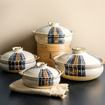 4 different ceramic beige casseroles painted with colored lines