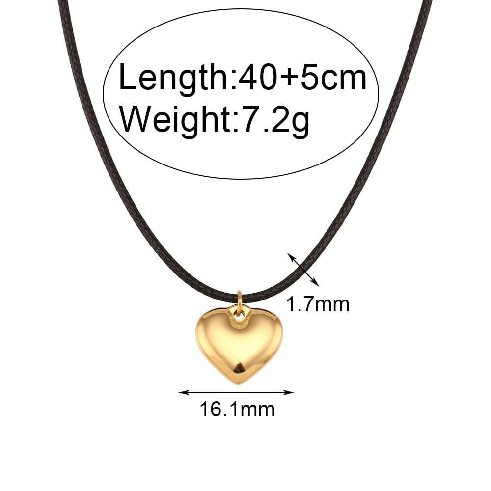 A rope chain with a gold heart pendant including its measures