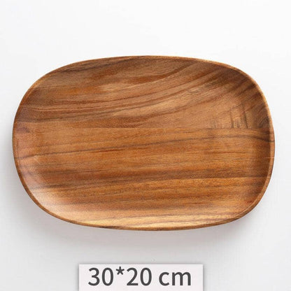 An acacia wood serving tray with an irregular shape of 30 and 20cm