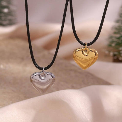 Two eco-friendly necklaces of  heart pendants with a rope chain