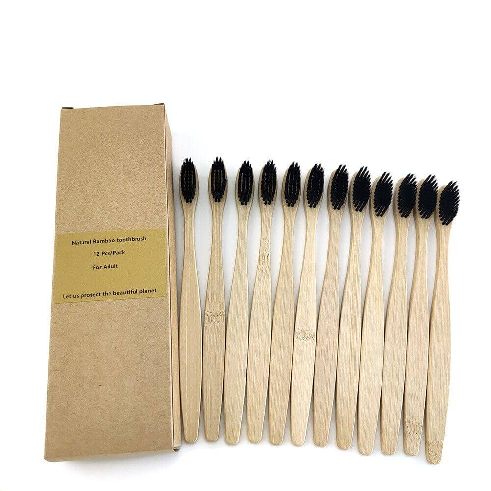 Set of 12 bamboo toothbrushes with biodegradable handles in cardboard box