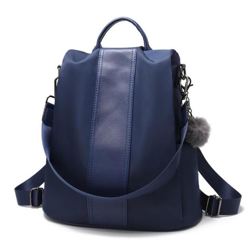 Blue Oxford anti-theft-backpack in a white background