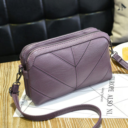 Purple Chic EcoAura Vegan Leather Shoulder Bag detailed with a zipper