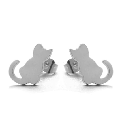 Silver cat earrings on a a white canvas