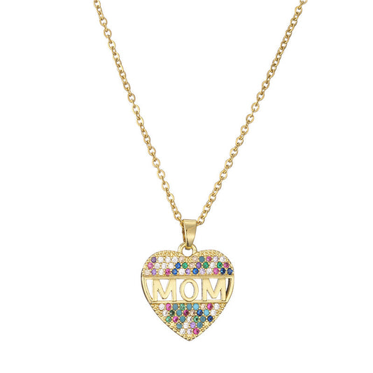 Beautiful gold heart MOM pendant necklace on a white canvas