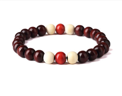 An elegant red wine wood beaded bracelet in a white background