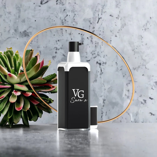 Open luxurious bottle of serum with a Logo of the cruelty-free brand VG Sar x on a grey marble countertop