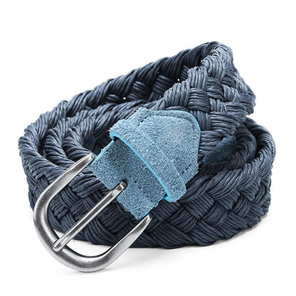 A blue turquoise rope belt on a white canvas