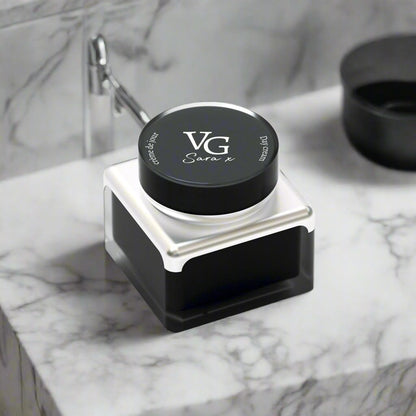 a night cream for men on a bathroom countertop made of marble