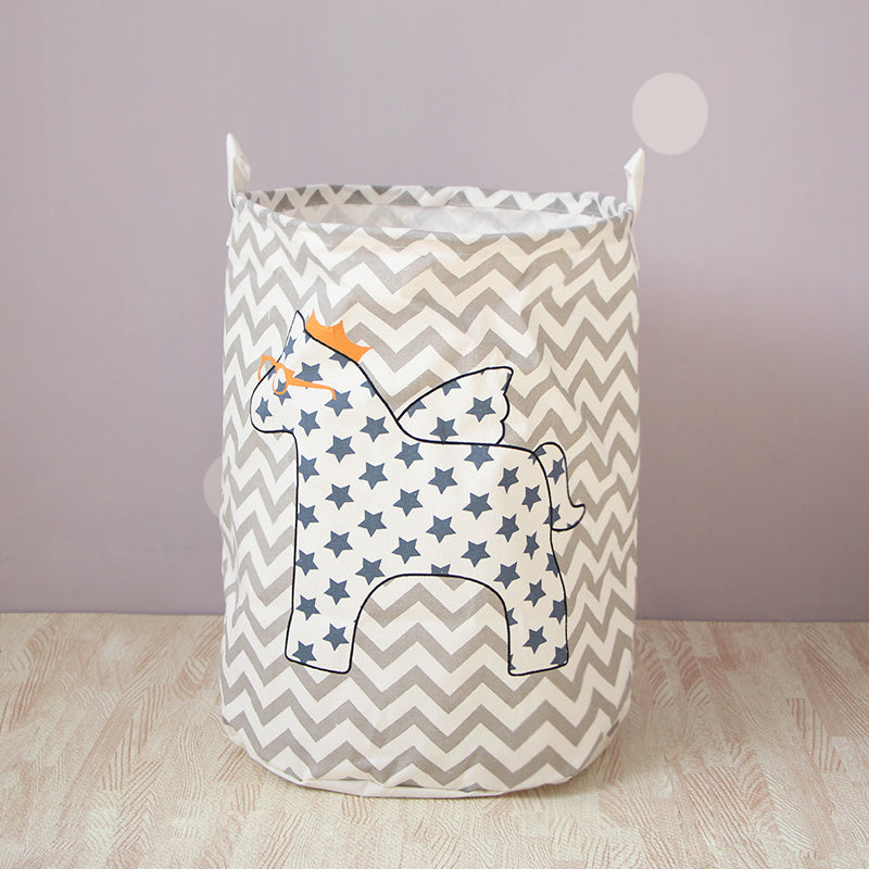 a children storage basket with a wave horse design in the center and geometric lines