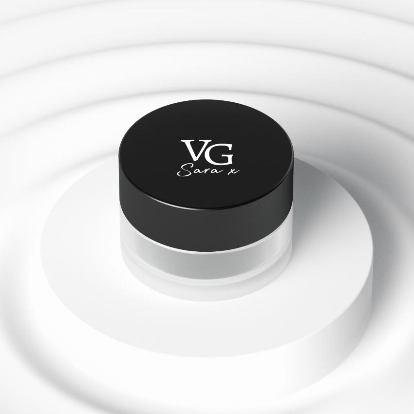 A container of white gel eyeliner on a white canvas