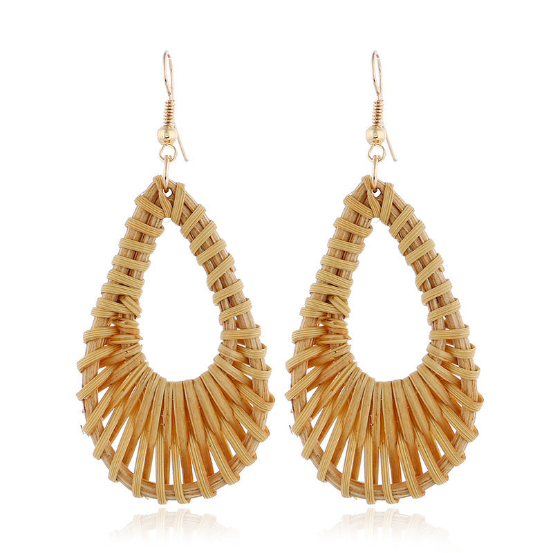 durable rattan drop earrings on a white background