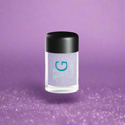 A white bottle of Cruelty-Free Mineral Stardust Glitter with a minimalist design in  a lilac canvas