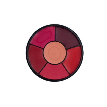 an opened lipstick wheel on a white canvas