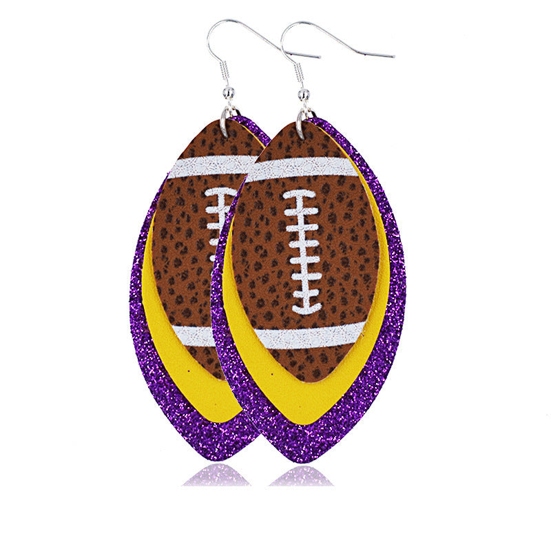 a pir of ruby earrings with yellow and purple colors