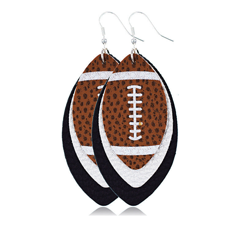 rugby earrings in black on a white canvas