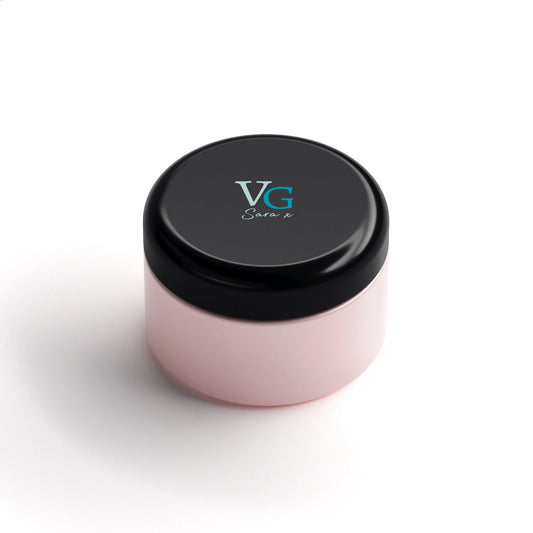 Pink container of the all-natural face clay mask with the VG logo