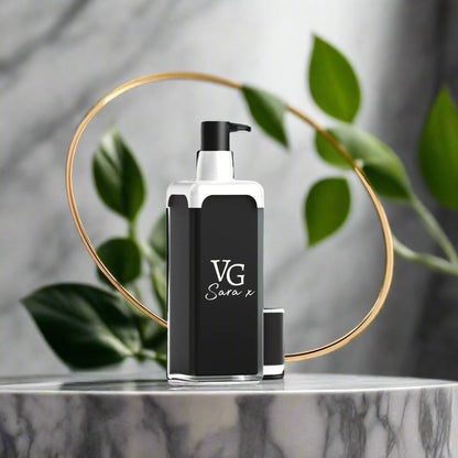 bottle of serum with a Logo  brand VG Sara x on a grey marble countertop and a gold ring at the back