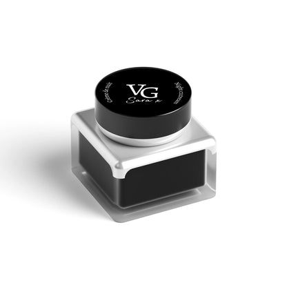 Cruelty-free night cream bottle in black and white  with  branding logo VG Sara x