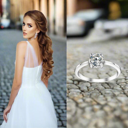 A bride wearing a wedding dress beside her silver wedding ring on a city background