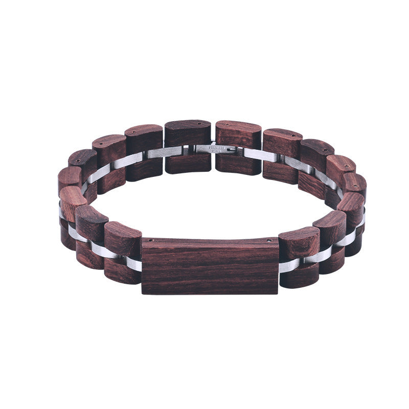 A red wood bracelet of ebony in a white canvas