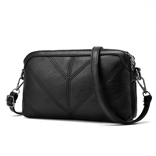 Black Chic EcoAura Vegan Leather Shoulder Bag featuring a zipper closure