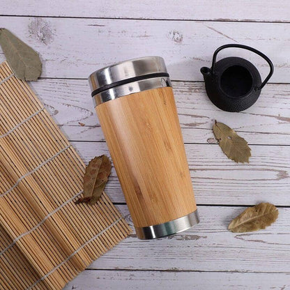 Eco-friendly bamboo thermos mug with stainless steel accents and handle