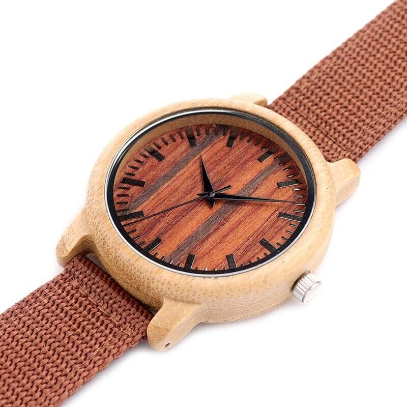 BOBO BIRD bamboo watch with a dark face and a chestnut brown strap