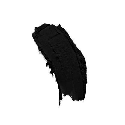 Matte black vegan lipstick presented on a white surface