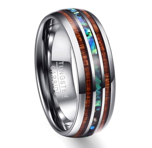 Close-up of the eco-friendly tungsten ring featuring abalone and acacia wood inlay