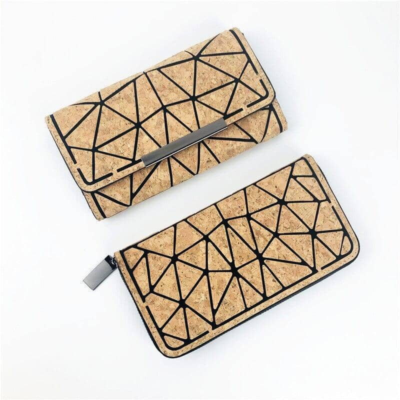 Pair of cork grain hand wallets with eco-conscious geometric designs side by side