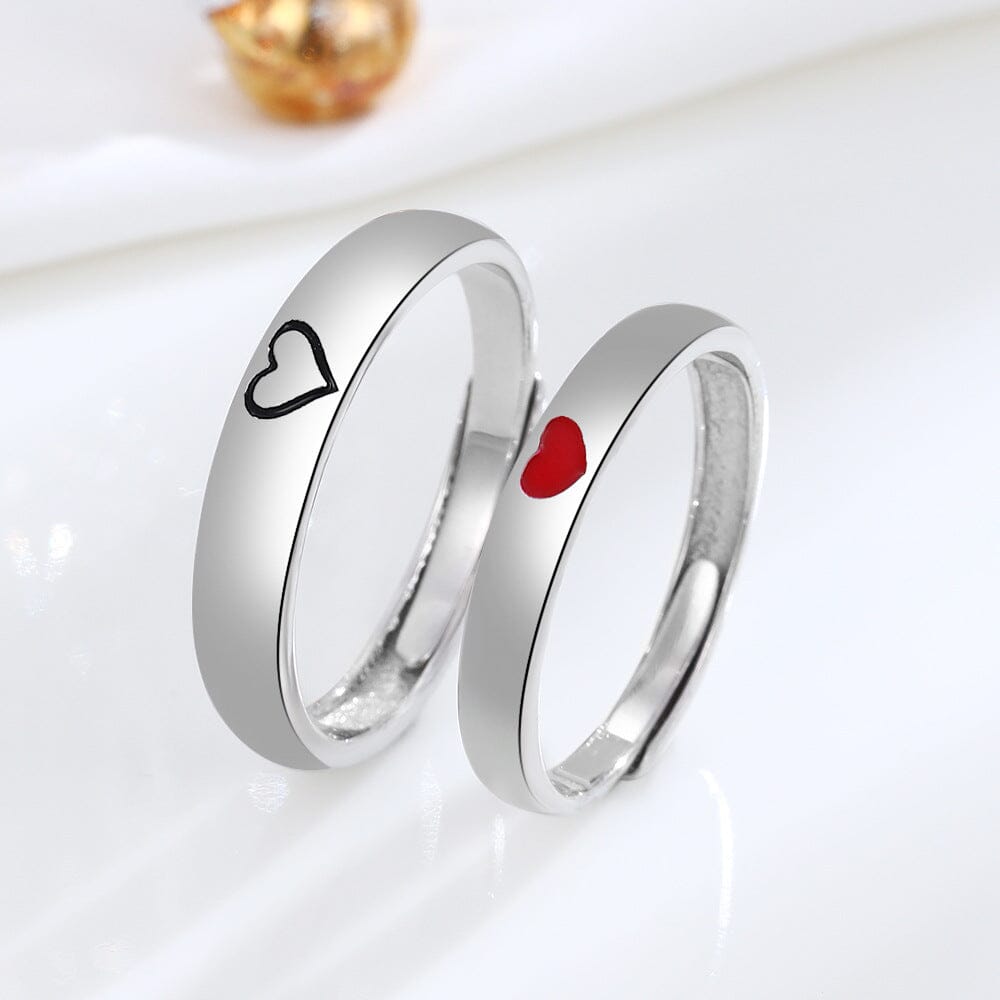 Pair of eco-friendly sterling silver rings with heart designs