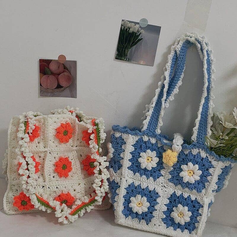 two hand knitted shoulder bags crochet with different color floral pattern