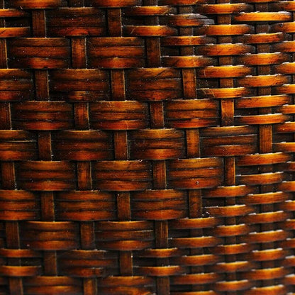 Close-up of an ancient bamboo bag showcasing its intricate brown and black pattern