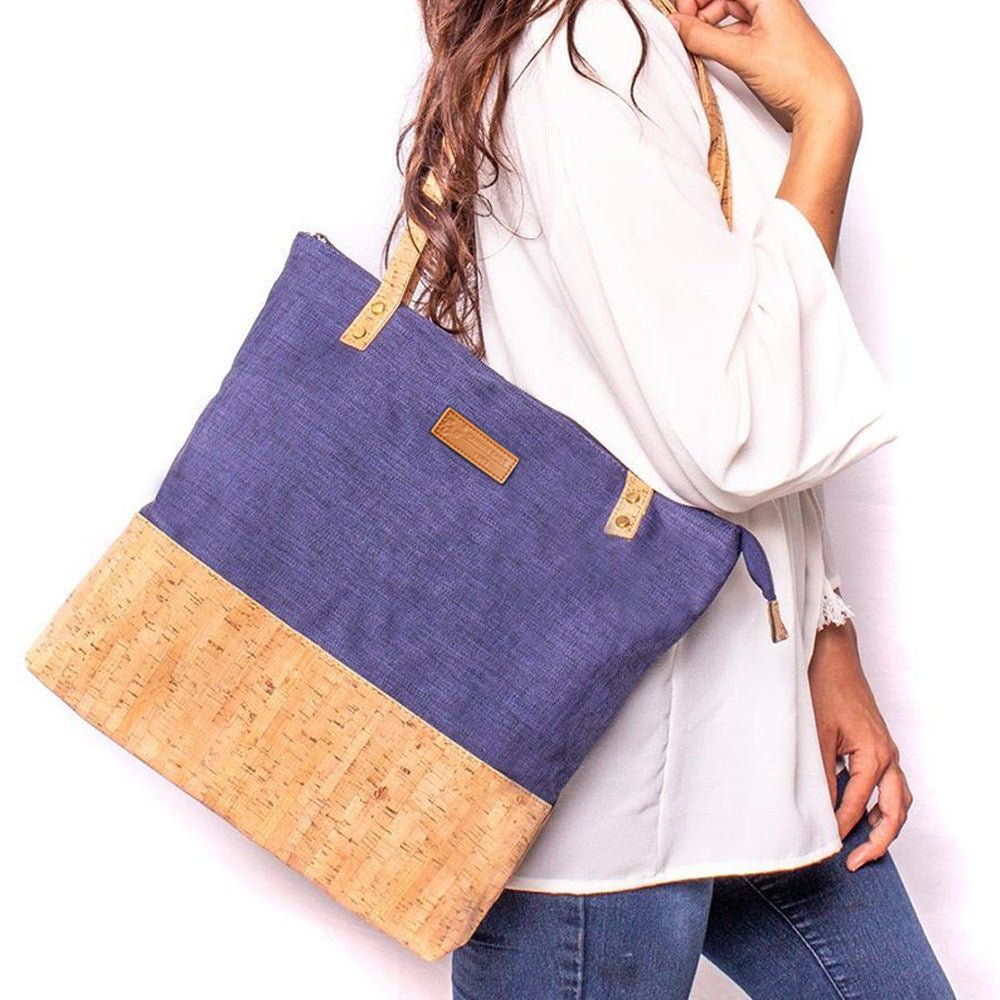 woman wearing an eco-friendly handmade blue women's handbag